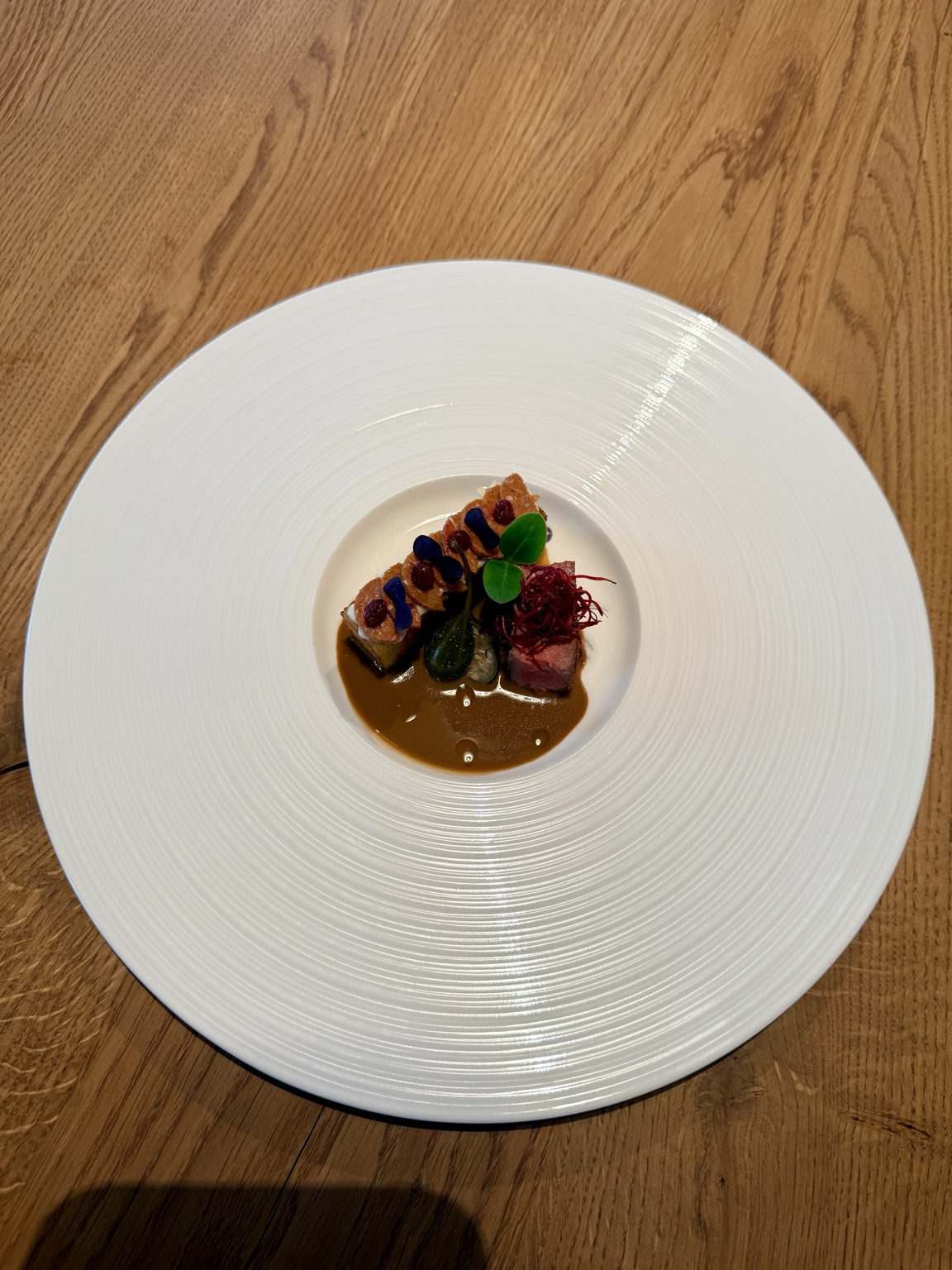 DUALITY dish with rare beef, apple capers, demi-glace and brioche