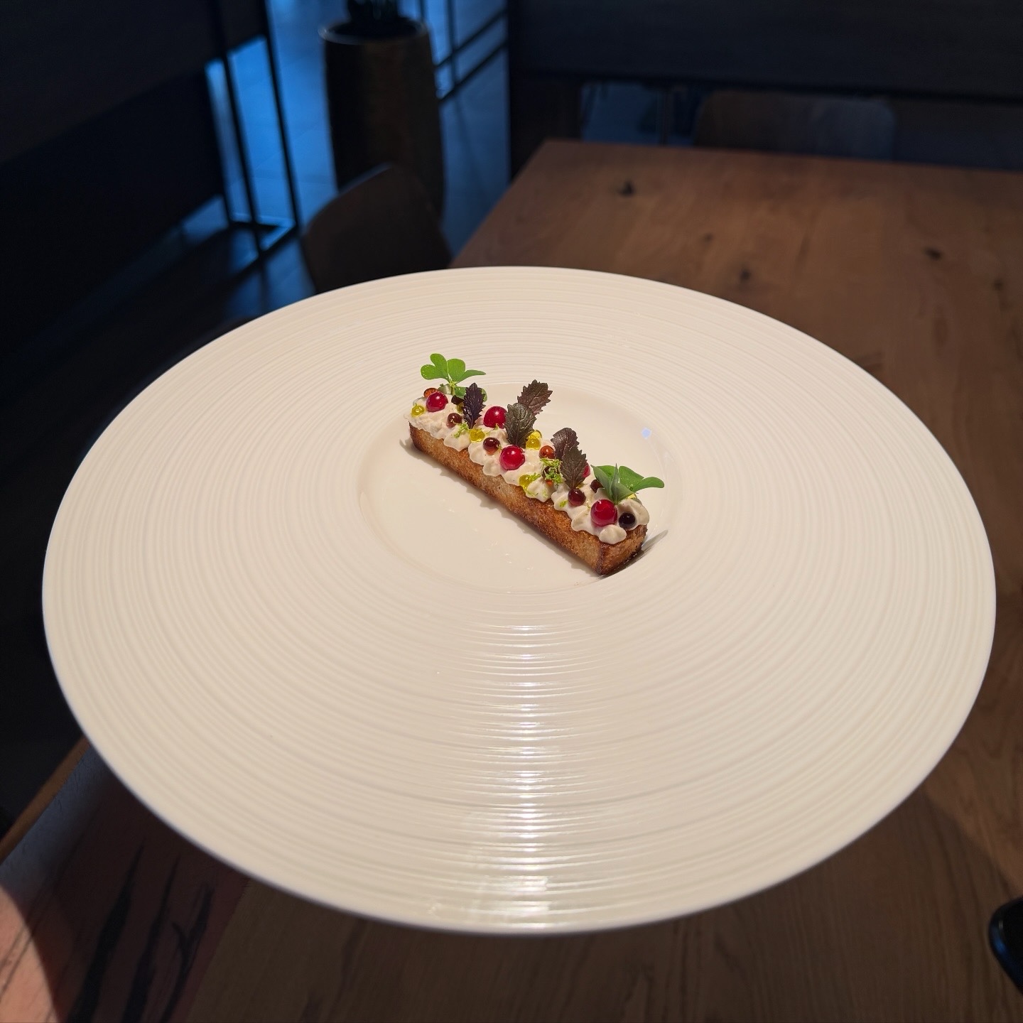 PRELUDE amuse with crispy brioche, burrata cream, truffle caviar, mushroom powder and red currants
